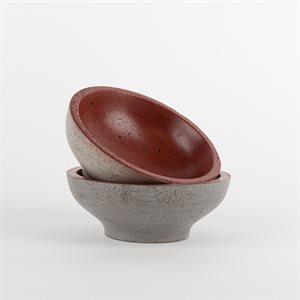 Small red and gray concrete bowl
