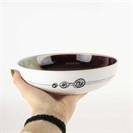 Porcelain pasta bowl with red and green interior