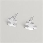 Puzzle Piece Stud Earrings in polished silver